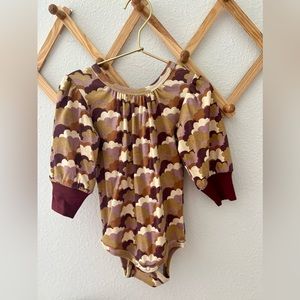 Exaggerated puff sleeve bodysuit